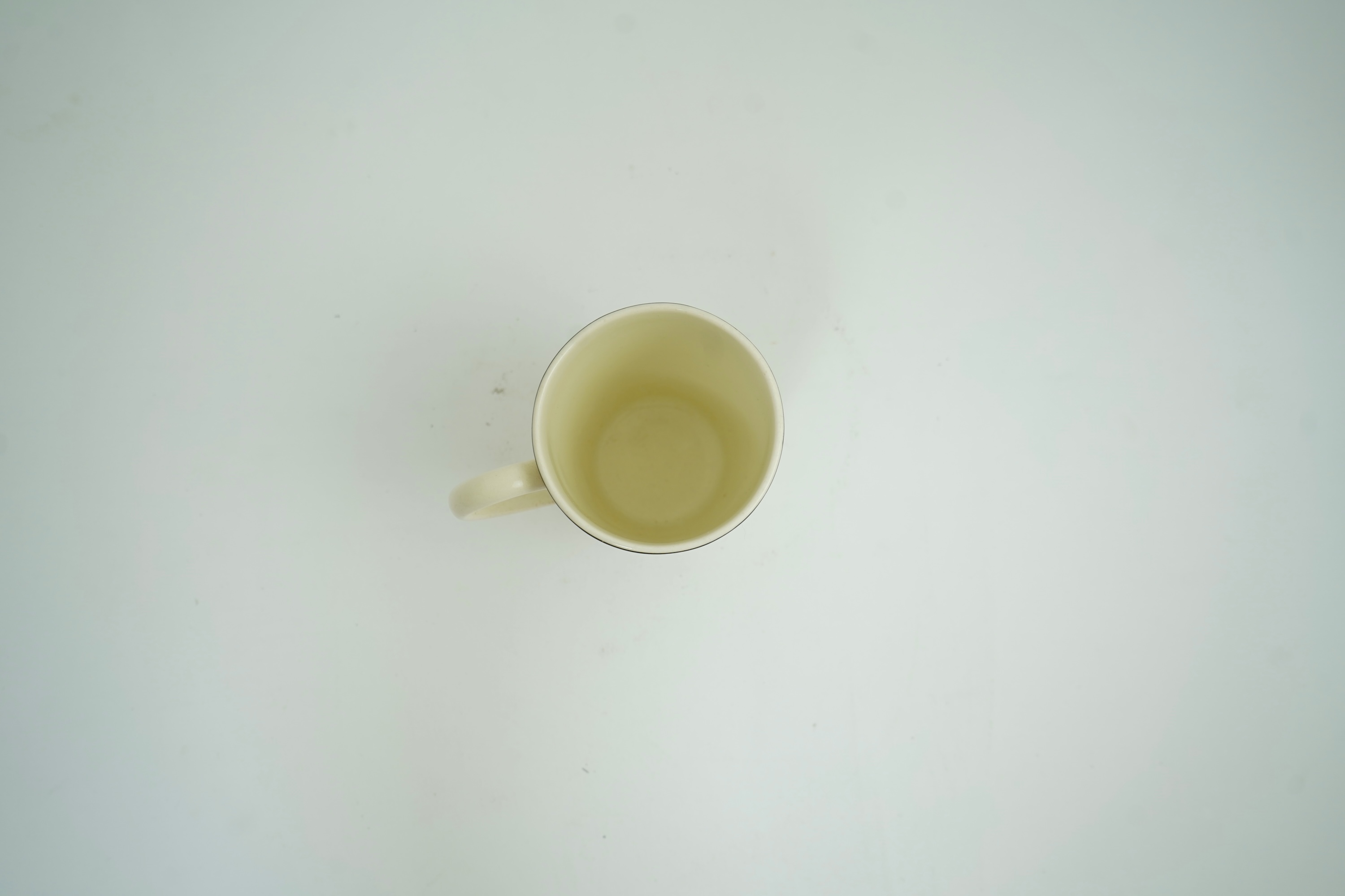 Eric Ravilious (1903-1942) for Wedgwood: A 'Garden Implements' lemonade mug